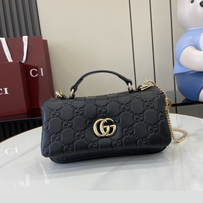 G*u*i top handle bags